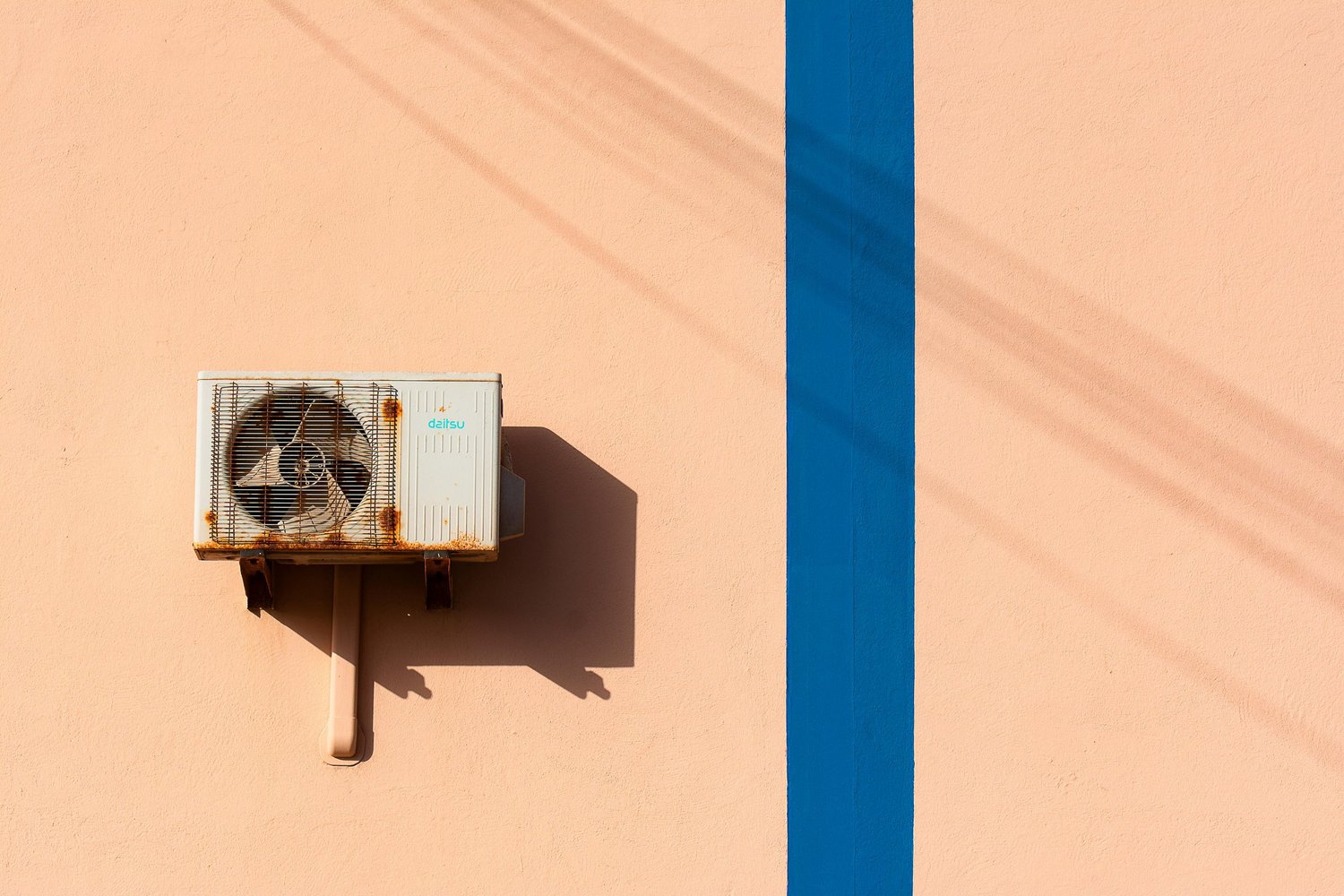 An HVAC technician working through a fully booked day