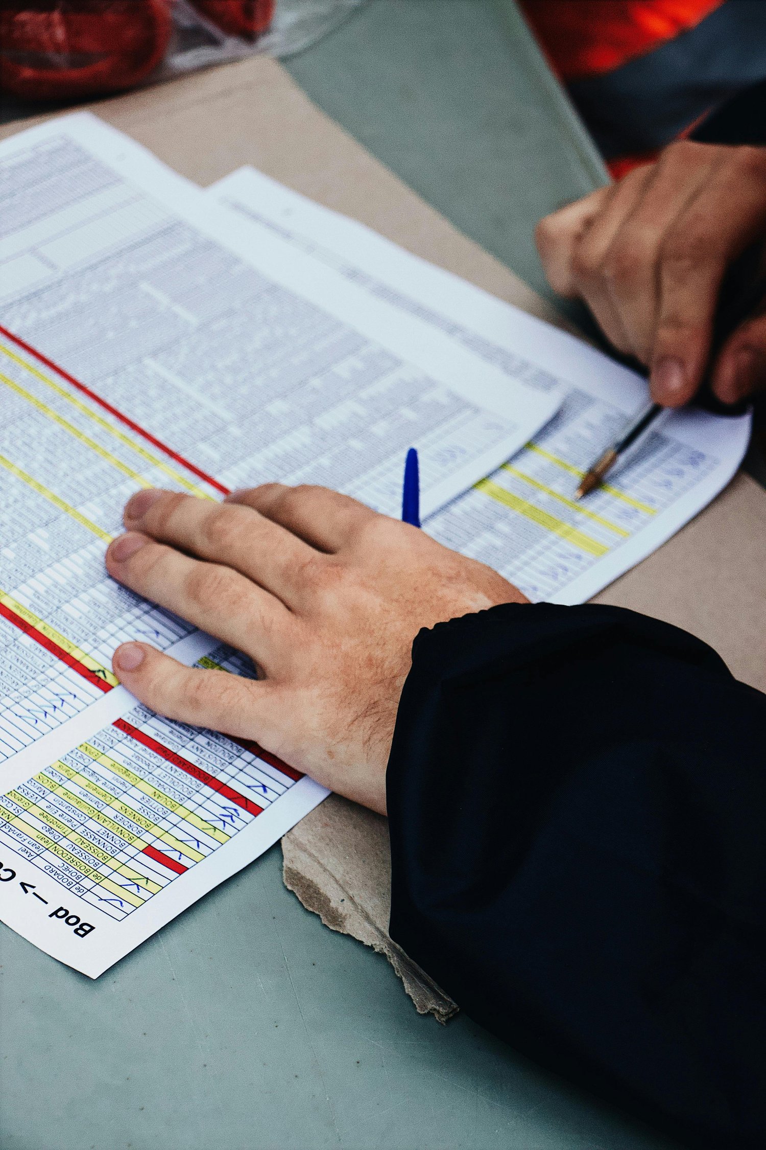 An HVAC owner reviewing the numbers at the end of the month